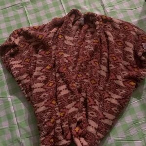 Delicacy- sleepwear, like a robe, very soft one size fits all